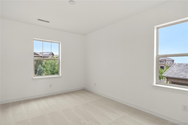 9566 Poppy Way, Arvada, CO 80007 - empty room featuring baseboards and light colored carpet