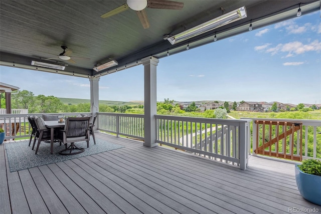 11817 Phoebe St, Parker, CO 80134 - wooden deck featuring a ceiling fan and outdoor dining space
