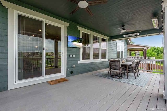11817 Phoebe St, Parker, CO 80134 - wooden deck with a ceiling fan and outdoor dining area