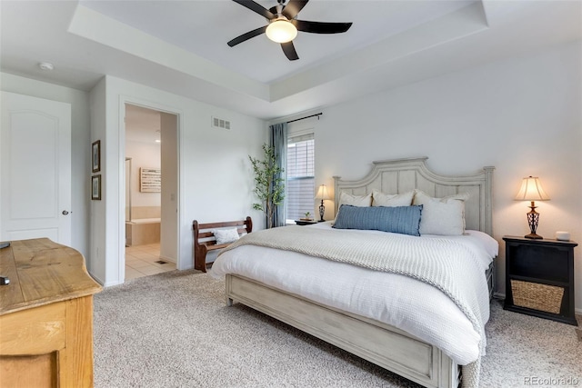 11817 Phoebe St, Parker, CO 80134 - bedroom with a raised ceiling, carpet floors, ensuite bath, and ceiling fan