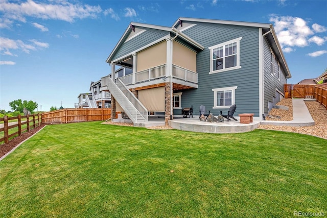 11817 Phoebe St, Parker, CO 80134 - rear view of house featuring a fenced backyard, a patio, and stairs