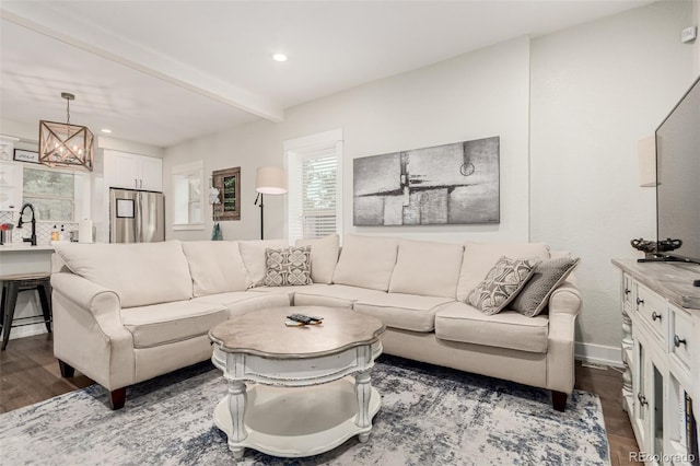 5123 W 41st Ave, Denver, CO 80212 - living room featuring a chandelier, wood finished floors, recessed lighting, and beamed ceiling