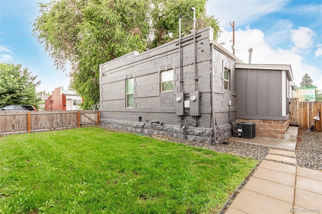5123 W 41st Ave, Denver, CO 80212 - view of side of property with a fenced backyard and a cooling unit