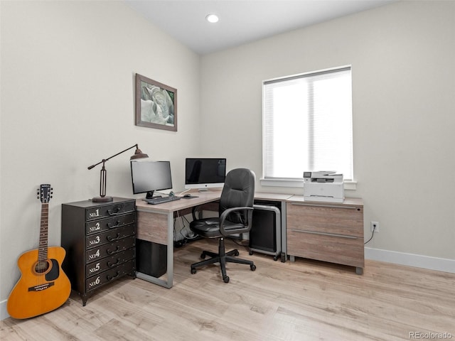 home office featuring light hardwood / wood-style flooring