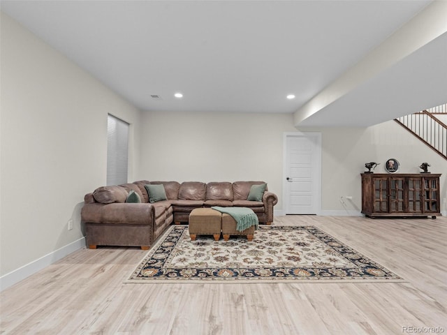 living room with light hardwood / wood-style floors