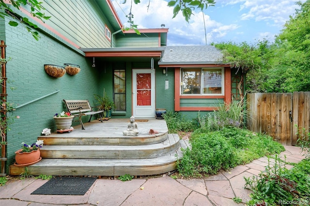 3982 Arbol Ct, Boulder, CO 80301 - doorway to property with brick siding and a wooden deck