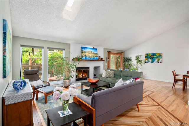 3982 Arbol Ct, Boulder, CO 80301 - living area featuring a brick fireplace, a textured ceiling, lofted ceiling, and parquet flooring