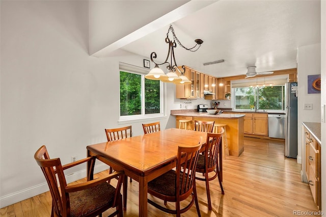 3982 Arbol Ct, Boulder, CO 80301 - dining area with healthy amount of natural light, light wood-style flooring, and ceiling fan