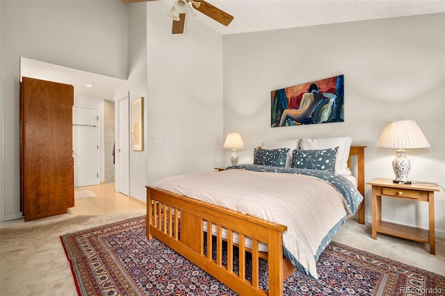 3982 Arbol Ct, Boulder, CO 80301 - carpeted bedroom with a towering ceiling and ceiling fan