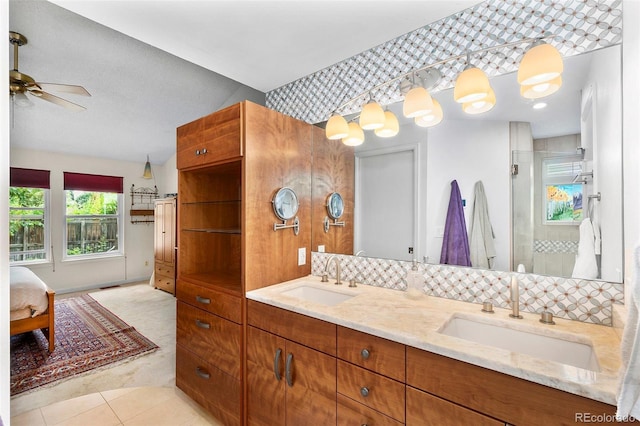 3982 Arbol Ct, Boulder, CO 80301 - full bathroom with double vanity, tile patterned floors, ceiling fan, and a shower with shower door