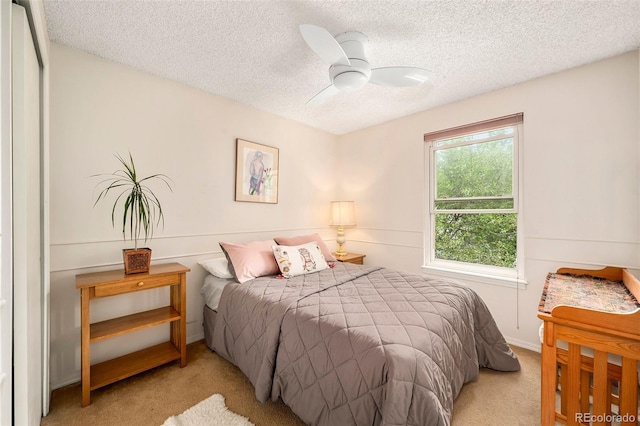 3982 Arbol Ct, Boulder, CO 80301 - carpeted bedroom featuring a textured ceiling and a ceiling fan