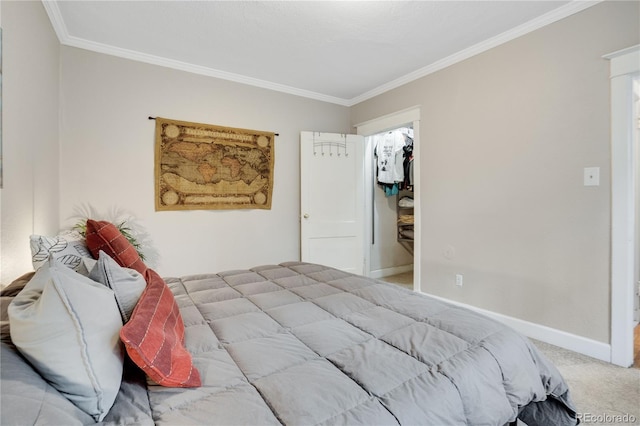 bedroom featuring a closet, carpet floors, and ornamental molding