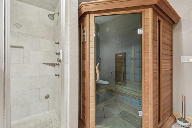 bathroom featuring an enclosed shower