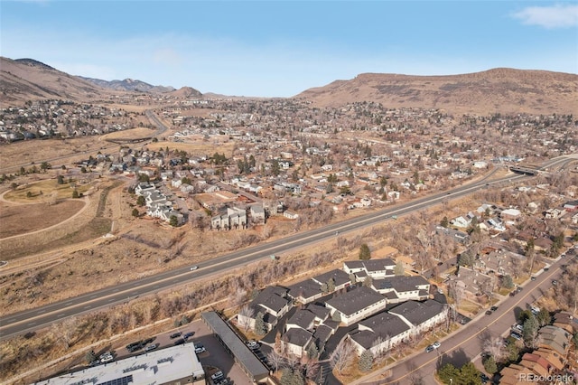 drone / aerial view featuring a mountain view