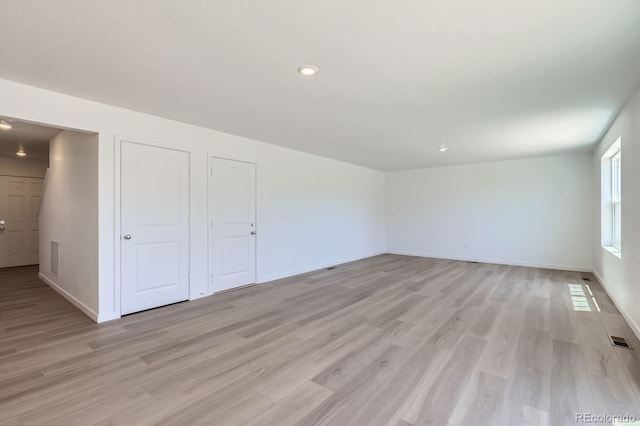 22094 E 39th Pl, Aurora, CO 80019 - unfurnished room featuring light wood finished floors and recessed lighting