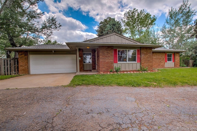 1705 Stonehenge Dr, Lafayette, CO 80026 - single story home with concrete driveway, brick siding, board and batten siding, and a garage