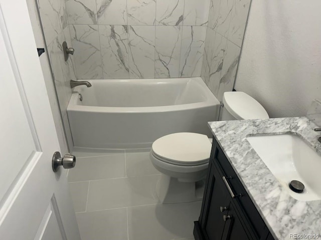 bathroom with shower / washtub combination, vanity, and toilet