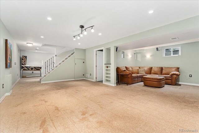 3765 E Easter Dr, Centennial, CO 80122 - living area featuring carpet floors, stairway, and recessed lighting