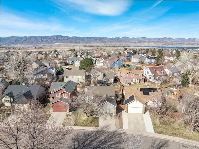 birds eye view of property featuring a residential view and a mountain view