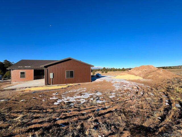 exterior space featuring a mountain view