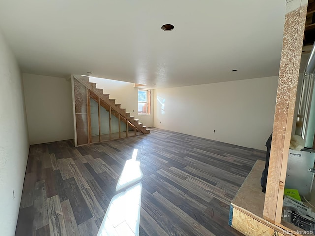 unfurnished room featuring dark hardwood / wood-style flooring