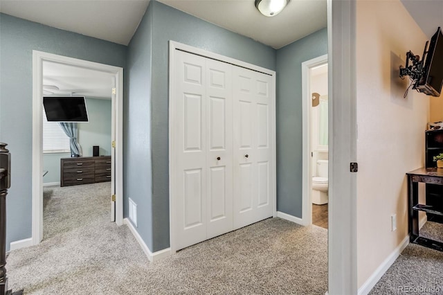 8060 Willowick Ct, Colorado Springs, CO 80925 - corridor featuring carpet floors and baseboards