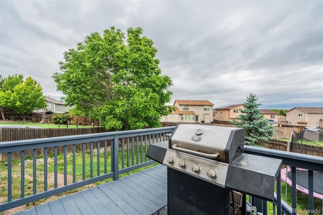 8060 Willowick Ct, Colorado Springs, CO 80925 - deck with a fenced backyard and a residential view