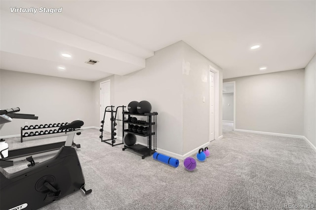 exercise room with carpet floors