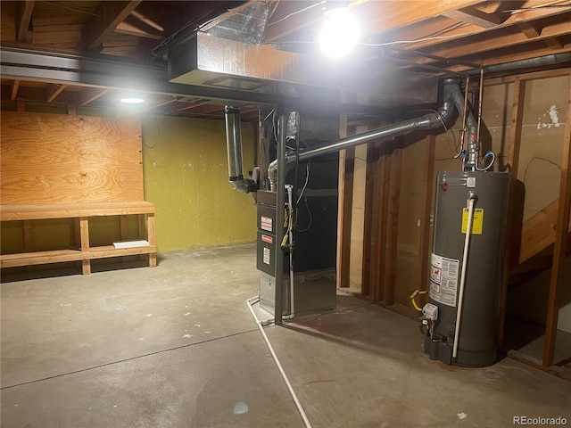 unfinished below grade area with heating unit and gas water heater