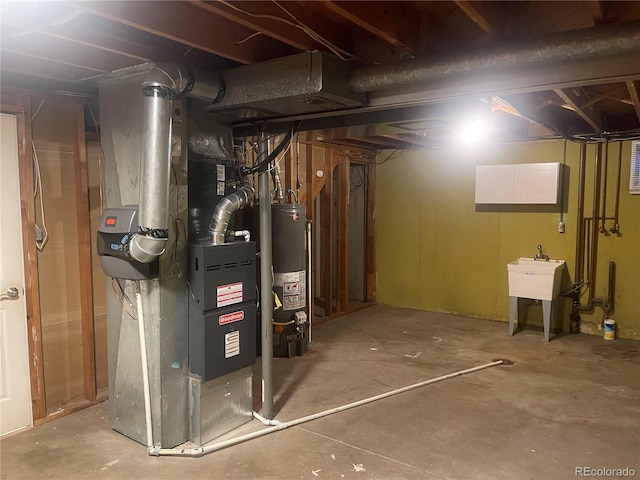 unfinished basement featuring heating unit and water heater