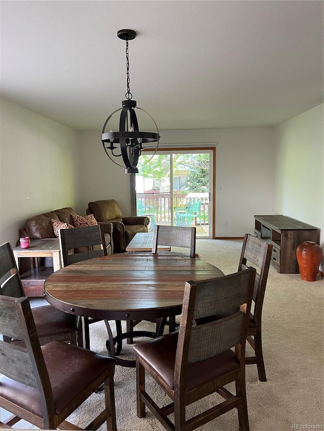 9724 W Euclid Dr, Littleton, CO 80123 - carpeted dining area with a chandelier