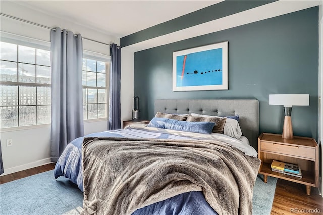 bedroom featuring hardwood / wood-style floors