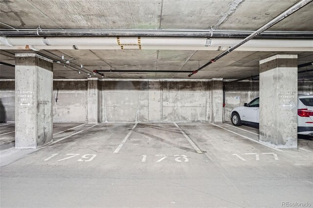 garage featuring a carport