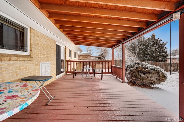 wooden deck featuring fence