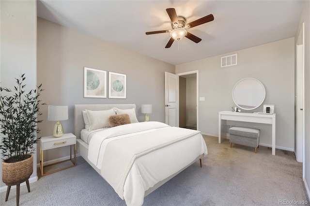 carpeted bedroom with ceiling fan