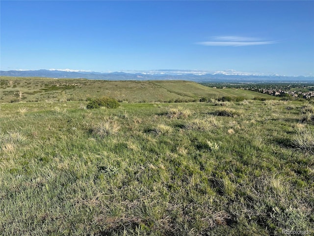 view of mountain feature with a rural view