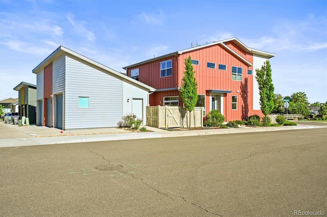 2004 Foxtail Ln Unit B, Lafayette, CO 80026 - townhome / multi-family property with a garage and board and batten siding