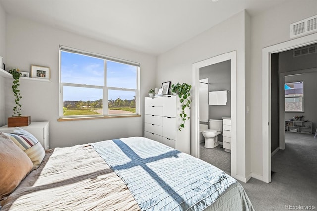 2004 Foxtail Ln Unit B, Lafayette, CO 80026 - bedroom with carpet flooring, baseboards, and connected bathroom
