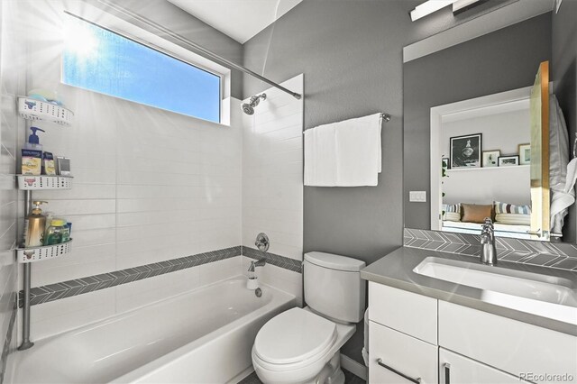 2004 Foxtail Ln Unit B, Lafayette, CO 80026 - full bathroom featuring shower / bath combination, vanity, and toilet