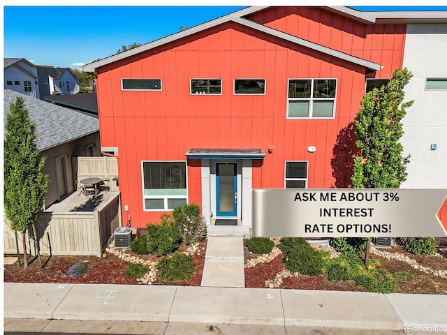 2004 Foxtail Ln Unit B, Lafayette, CO 80026 - view of front of house featuring board and batten siding and central AC unit