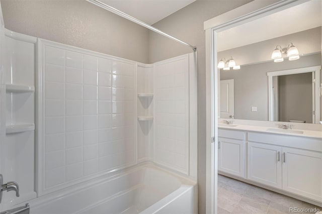 13477 Valentia St, Thornton, CO 80602 - bathroom with shower / tub combination and double vanity