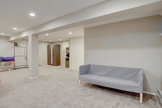 7427 S Ames Ct, Littleton, CO 80128 - sitting room featuring light colored carpet, recessed lighting, a baseboard radiator, and a baseboard heating unit
