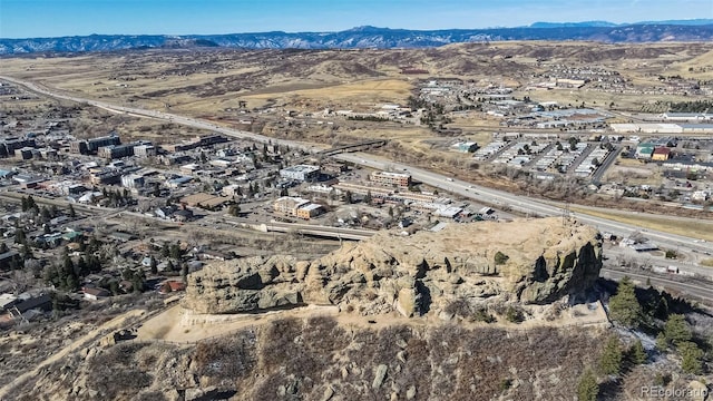 drone / aerial view featuring a mountain view