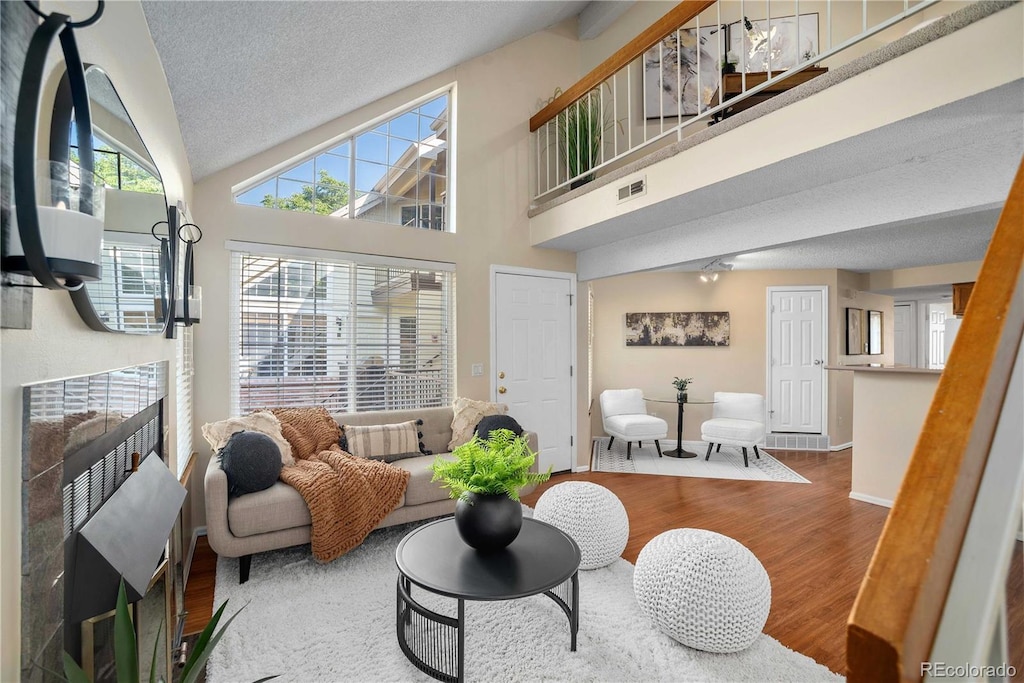 sunroom featuring lofted ceiling