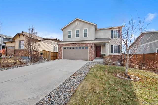 view of front property with a front yard and a garage