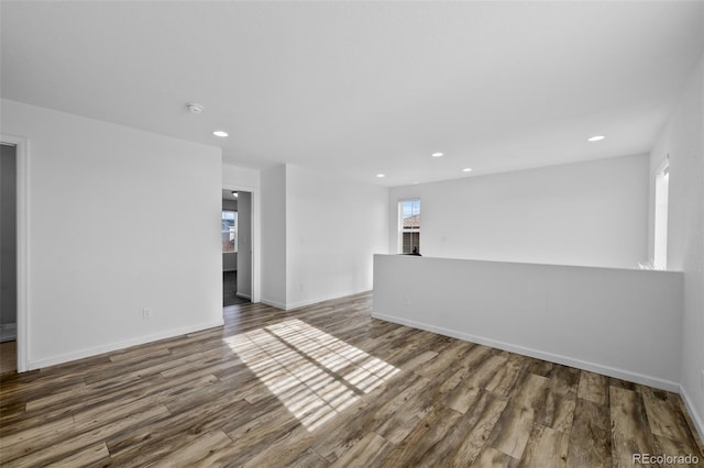 unfurnished room featuring hardwood / wood-style floors