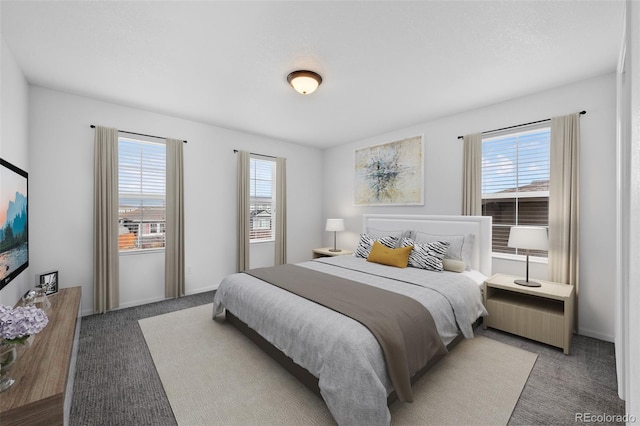 carpeted bedroom with multiple windows