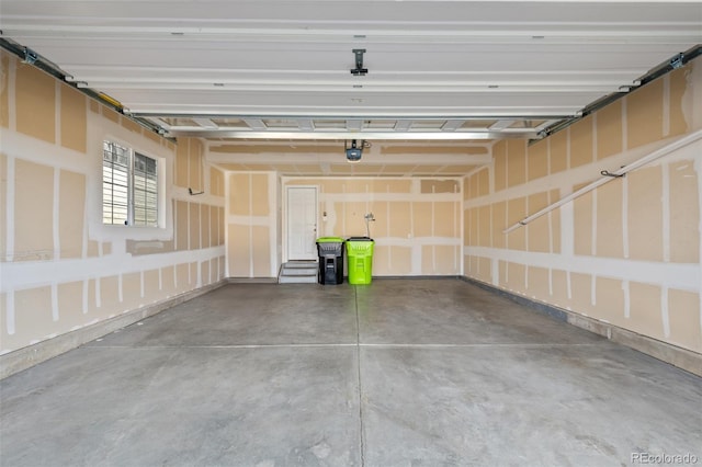 garage featuring a garage door opener