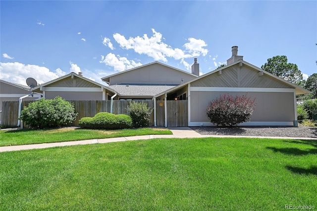 single story home featuring a front yard