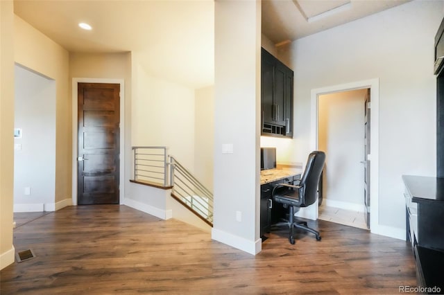 office with dark wood-style floors, visible vents, recessed lighting, and baseboards